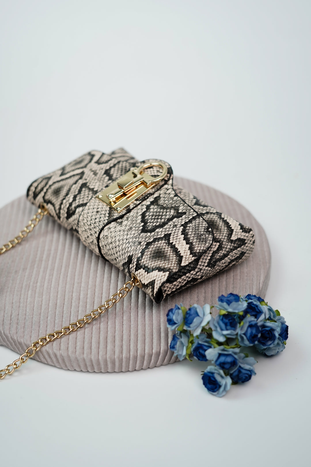 Elegance with an Edge Python Print Belted Carryall for Stylish Adventures