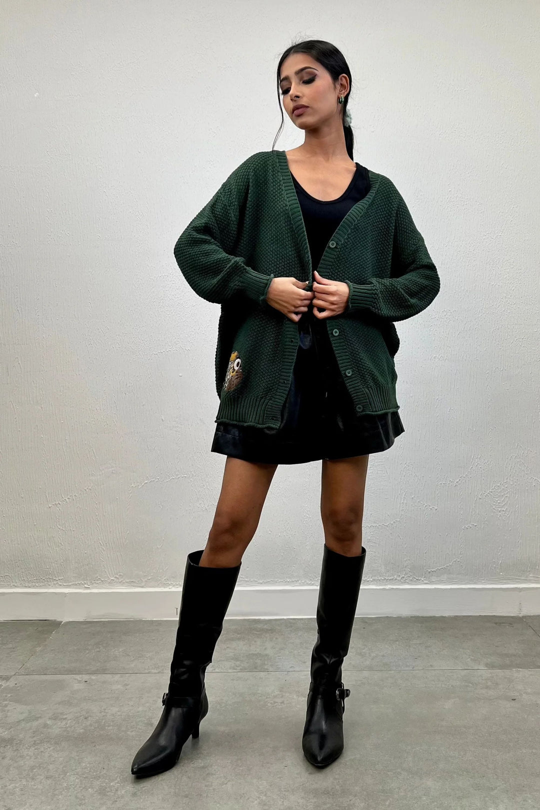 Stylish buttoned cardigan in dark green color