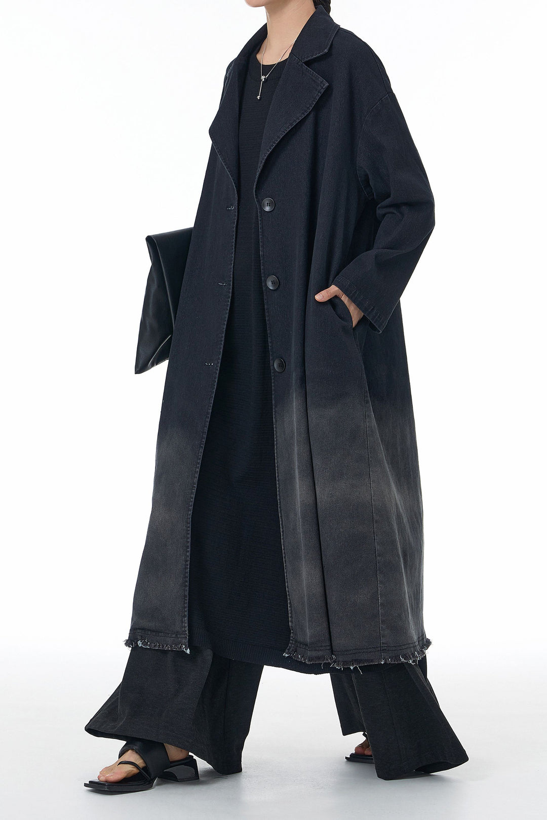 black denim coat with fringed hem