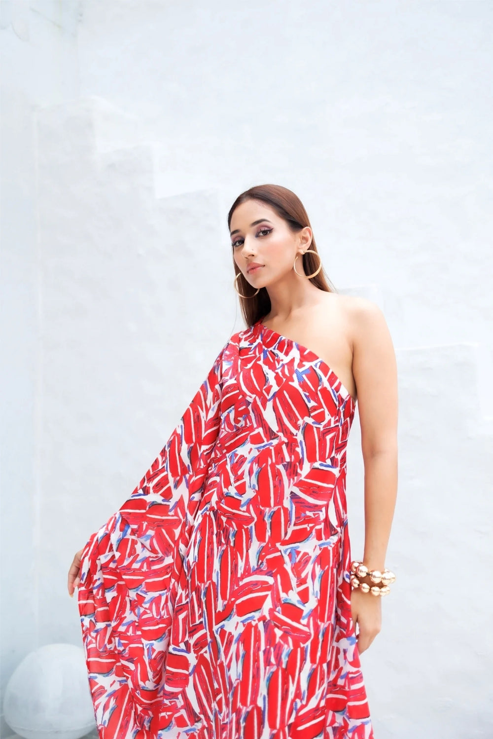 Abstract print off-shoulder gown for resort wear