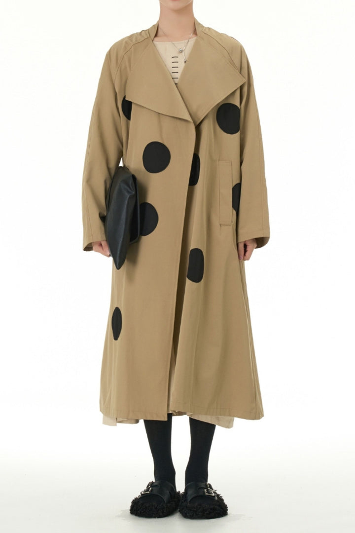 Light brown trench coat with polka dots