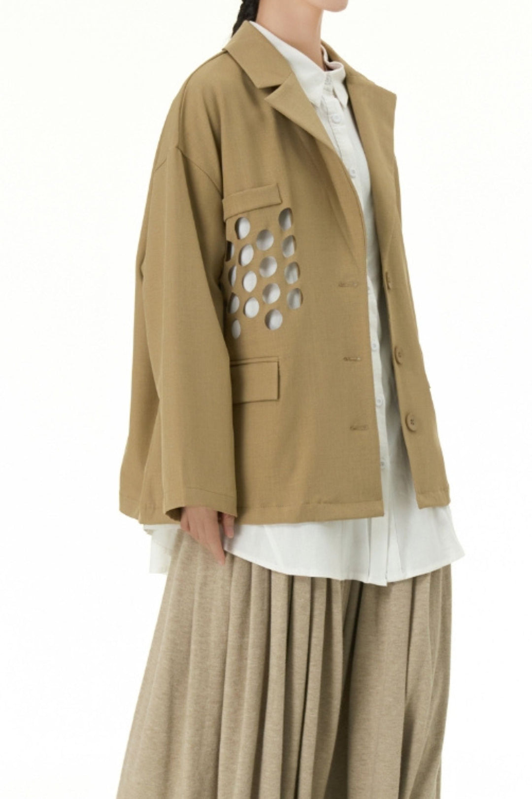 Trendy women’s khaki blazer with round cutouts