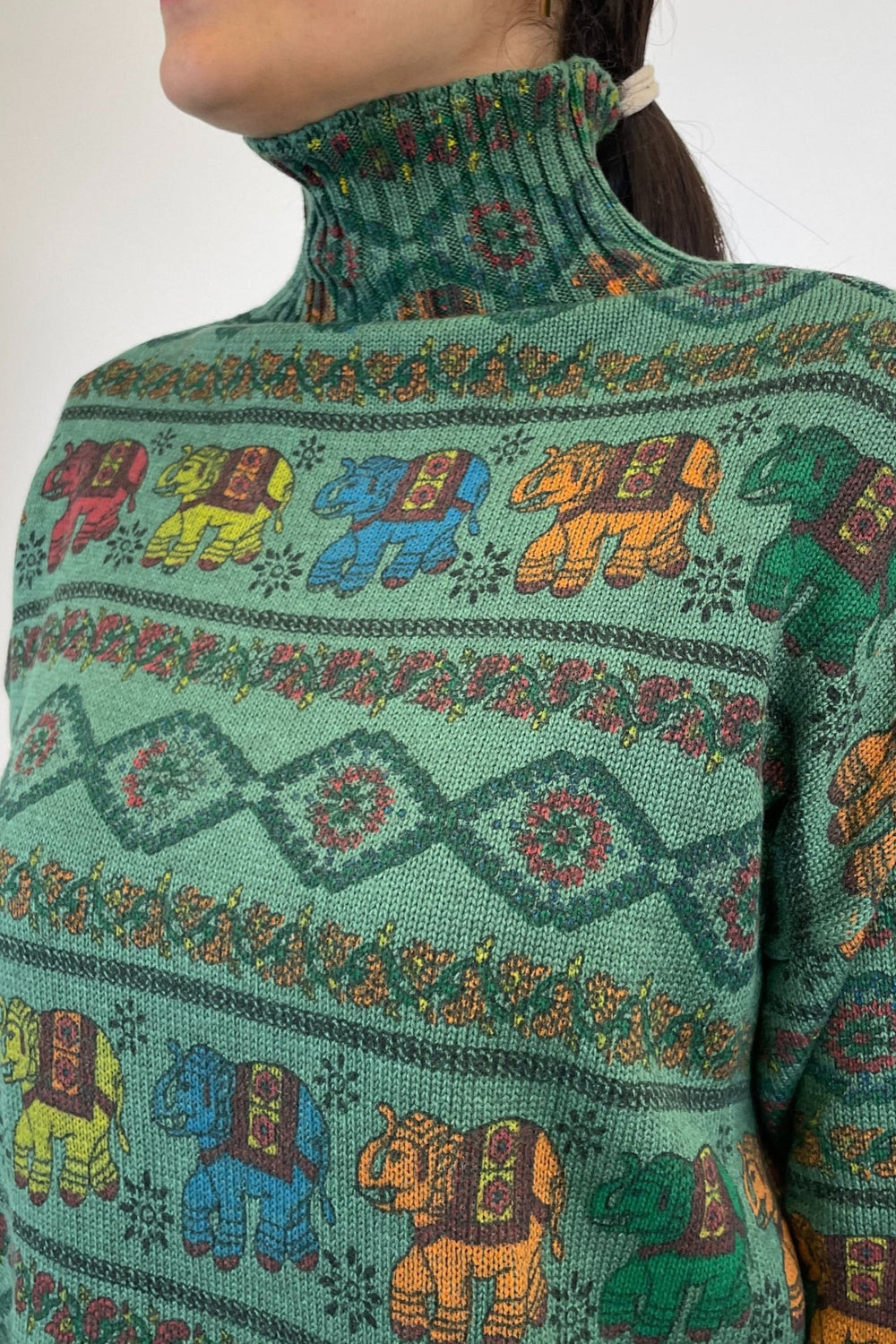 Comfortable high neck sweater in green block print