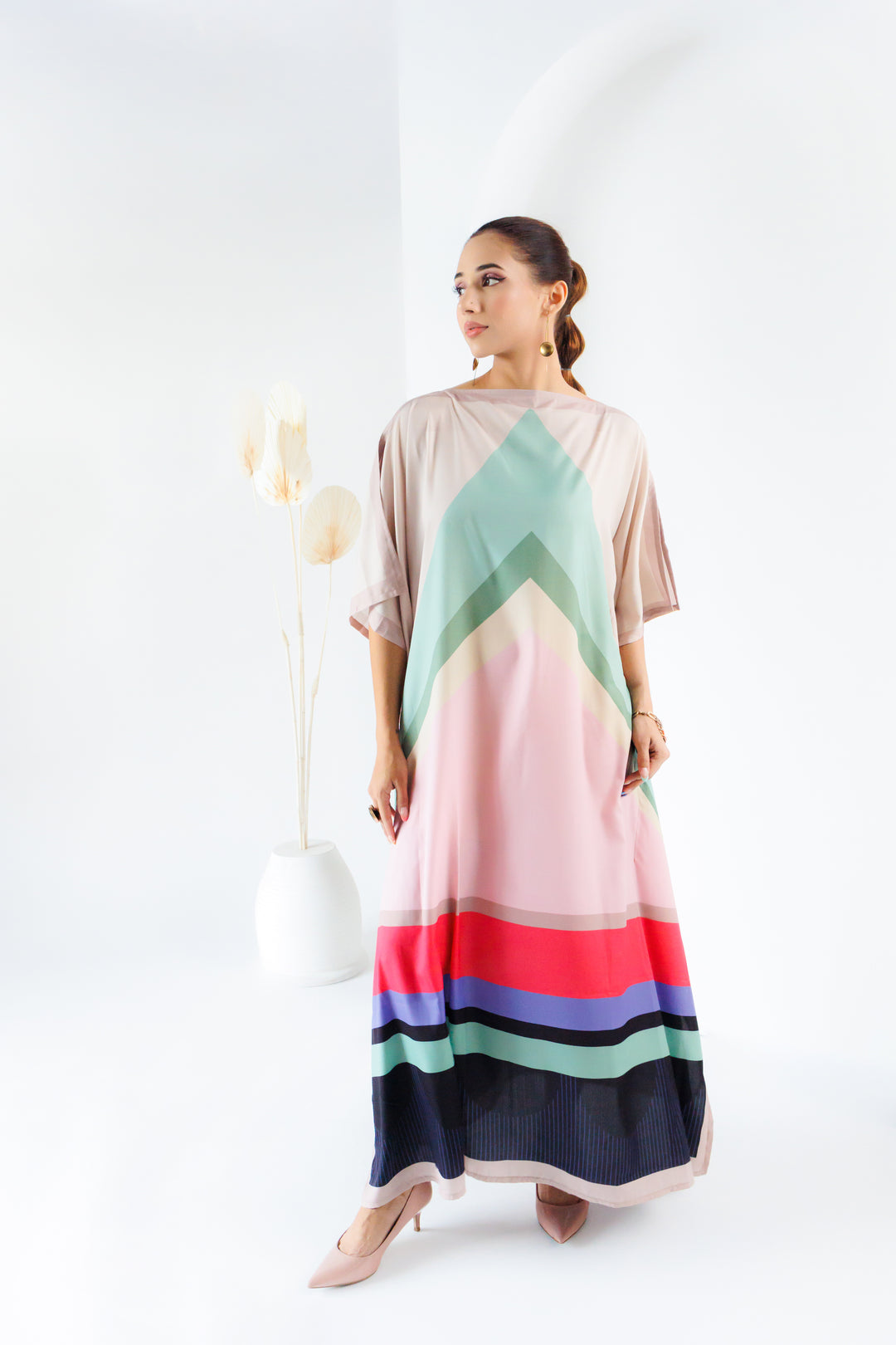 Stylish multicolored pastel kaftan attire for ladies.