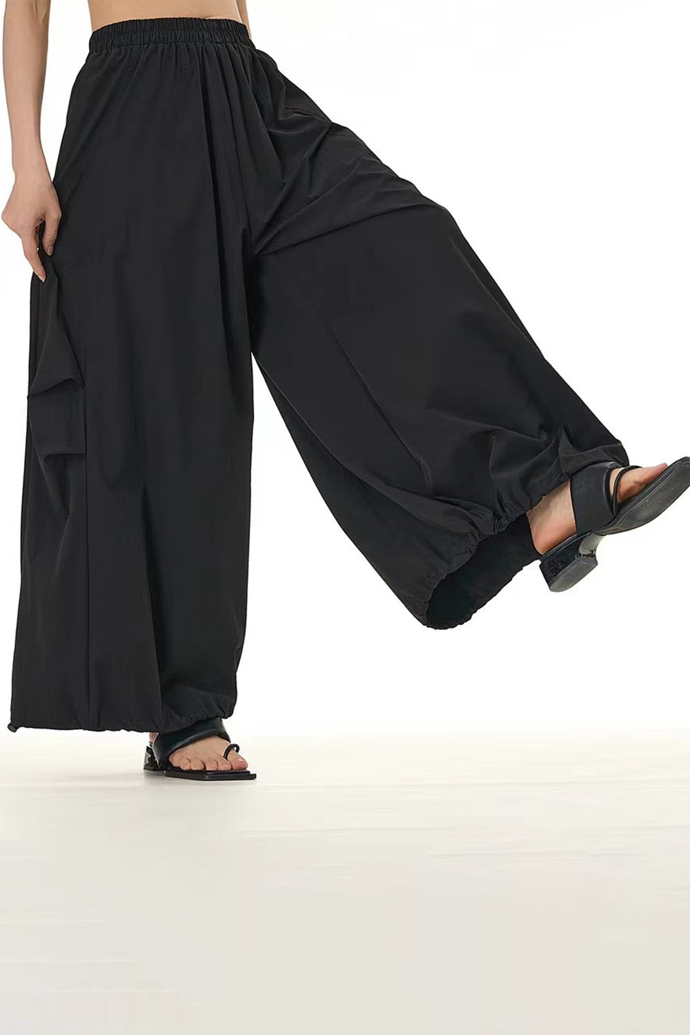 Black streetwear pants with elasticated waist