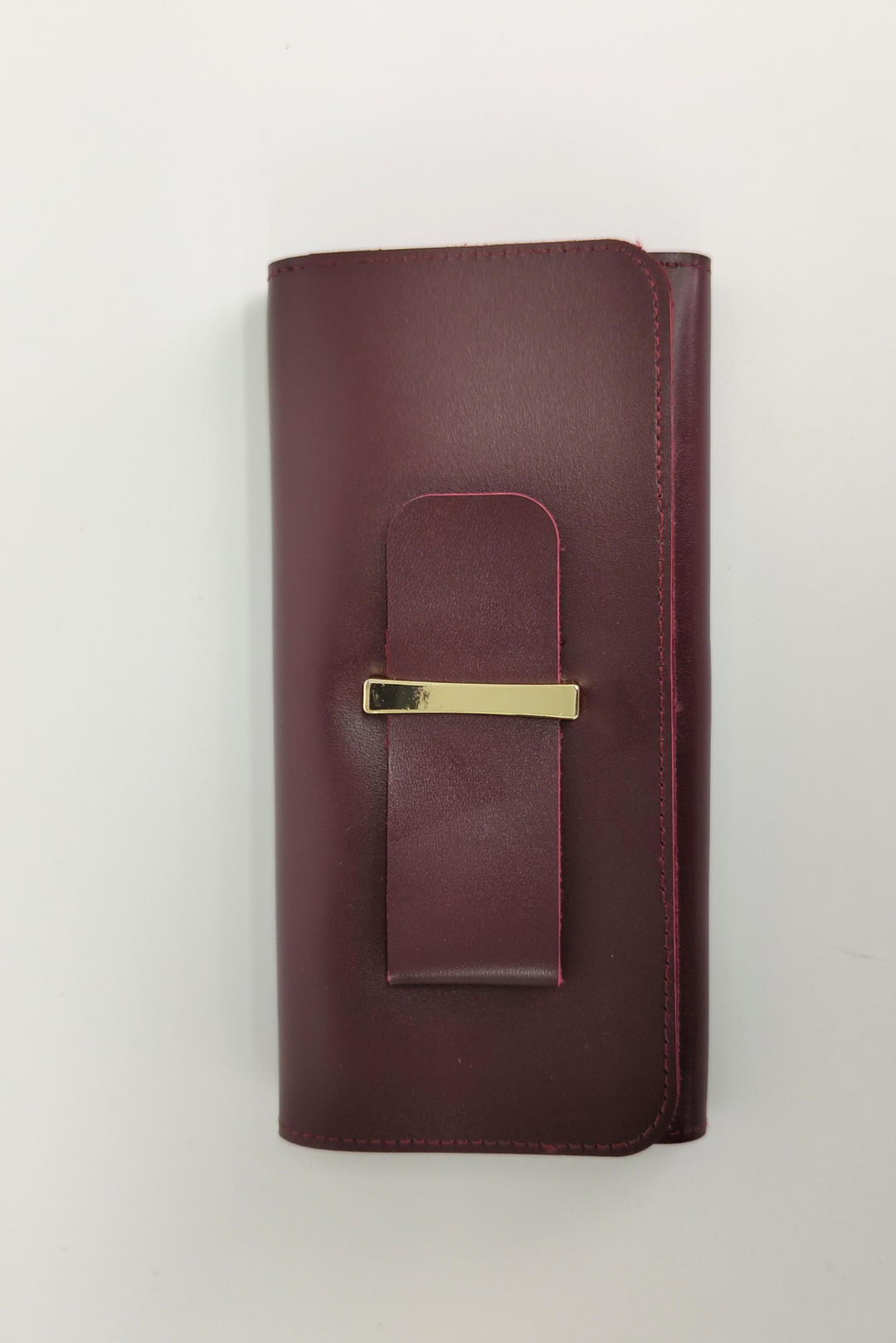 Maroon clutch 2025