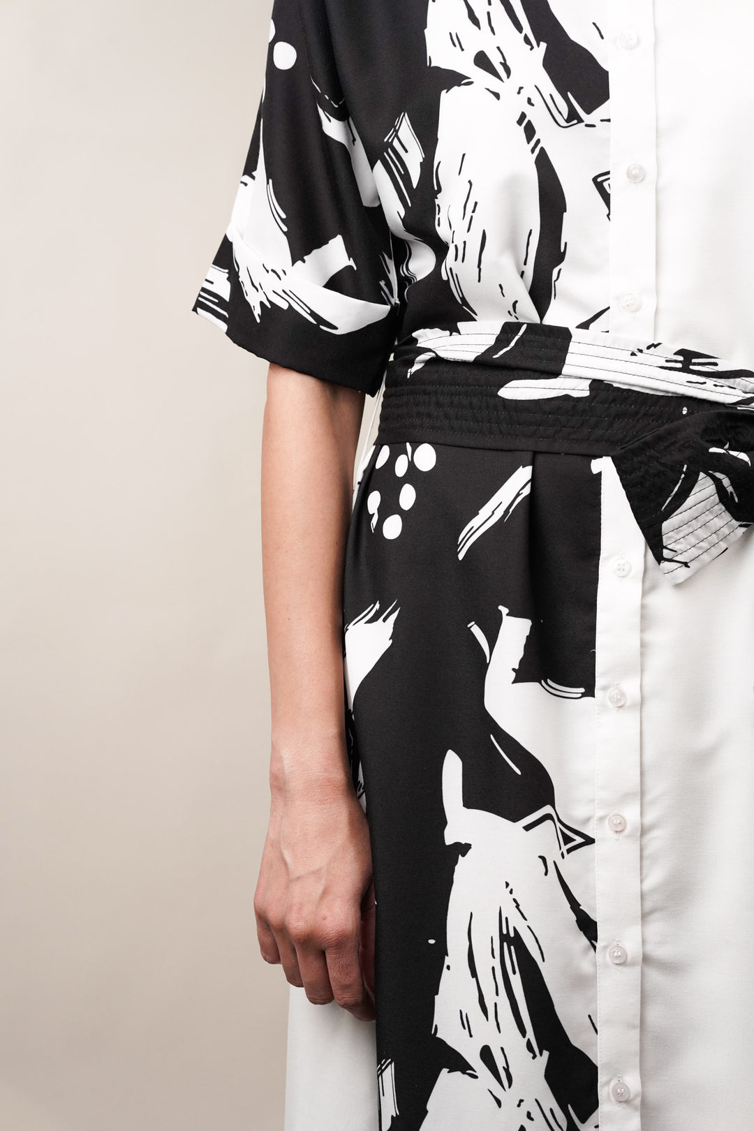 Versatile black and white shirt dress with abstract print