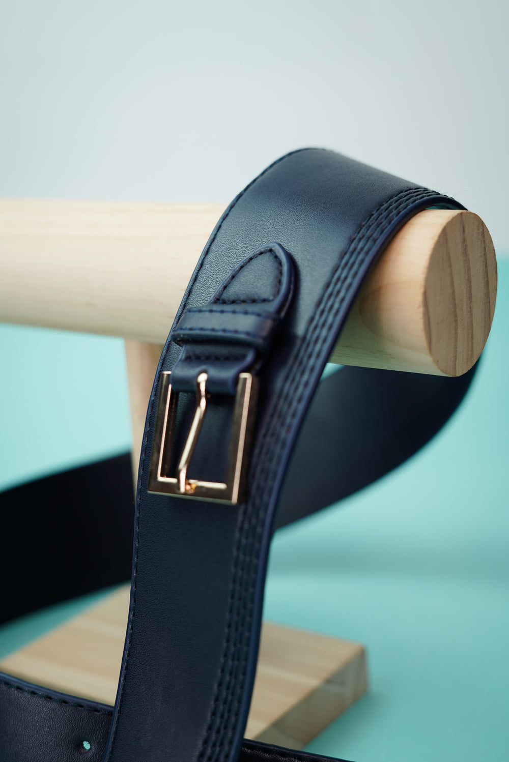 Women's designer leather belt with golden buckle