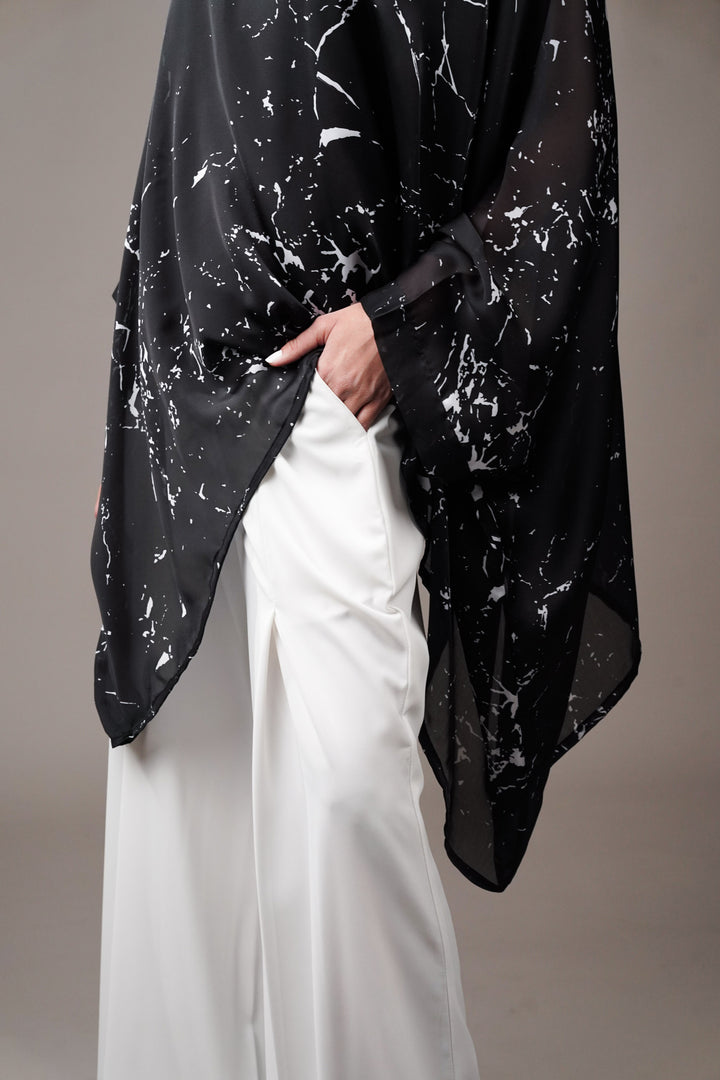 Silk georgette top paired with fluid crepe pants