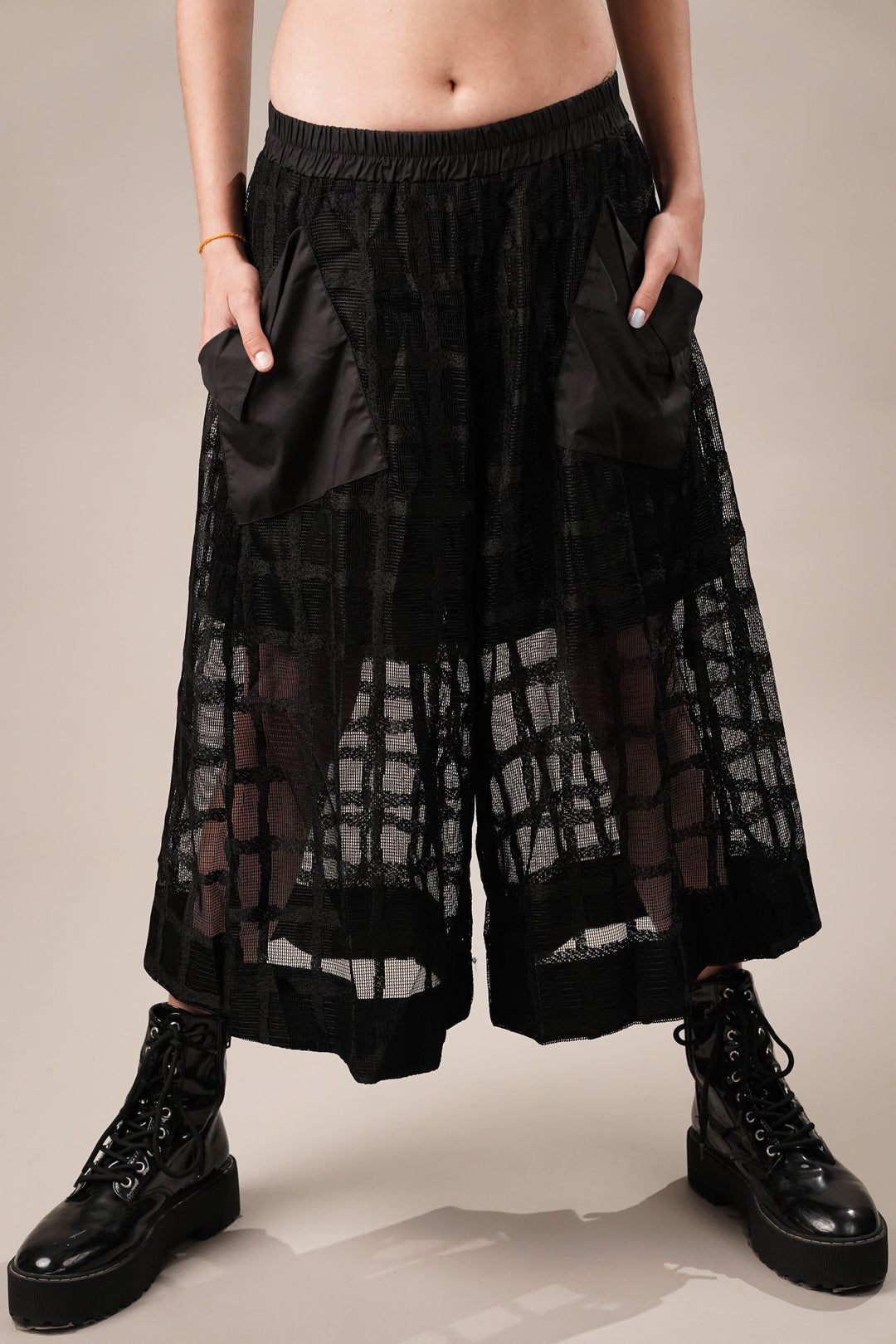 Trendy sheer black culottes with pockets