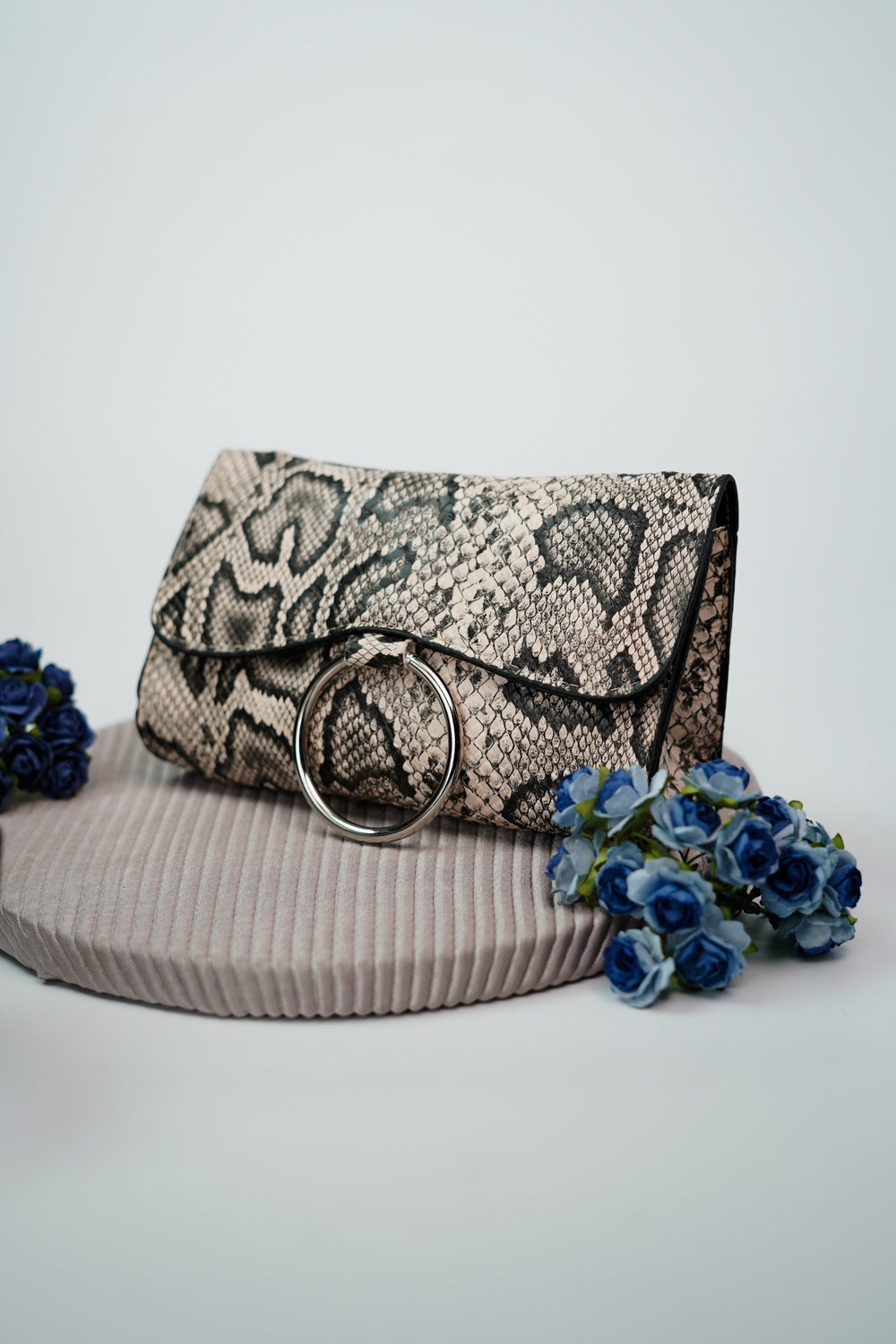Fashionably Styled Sling Belt Bag Featuring an Exotic Reptile Pattern