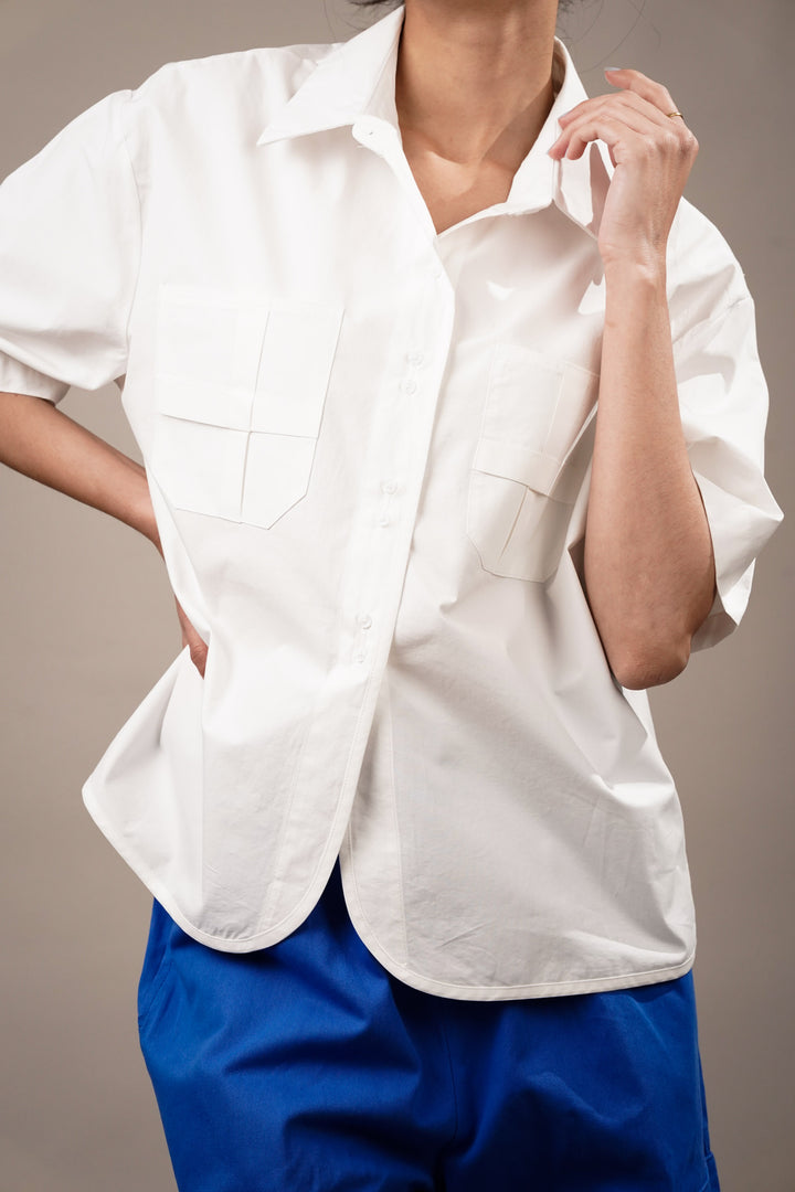 Elegant white shirts with patch pockets for women
