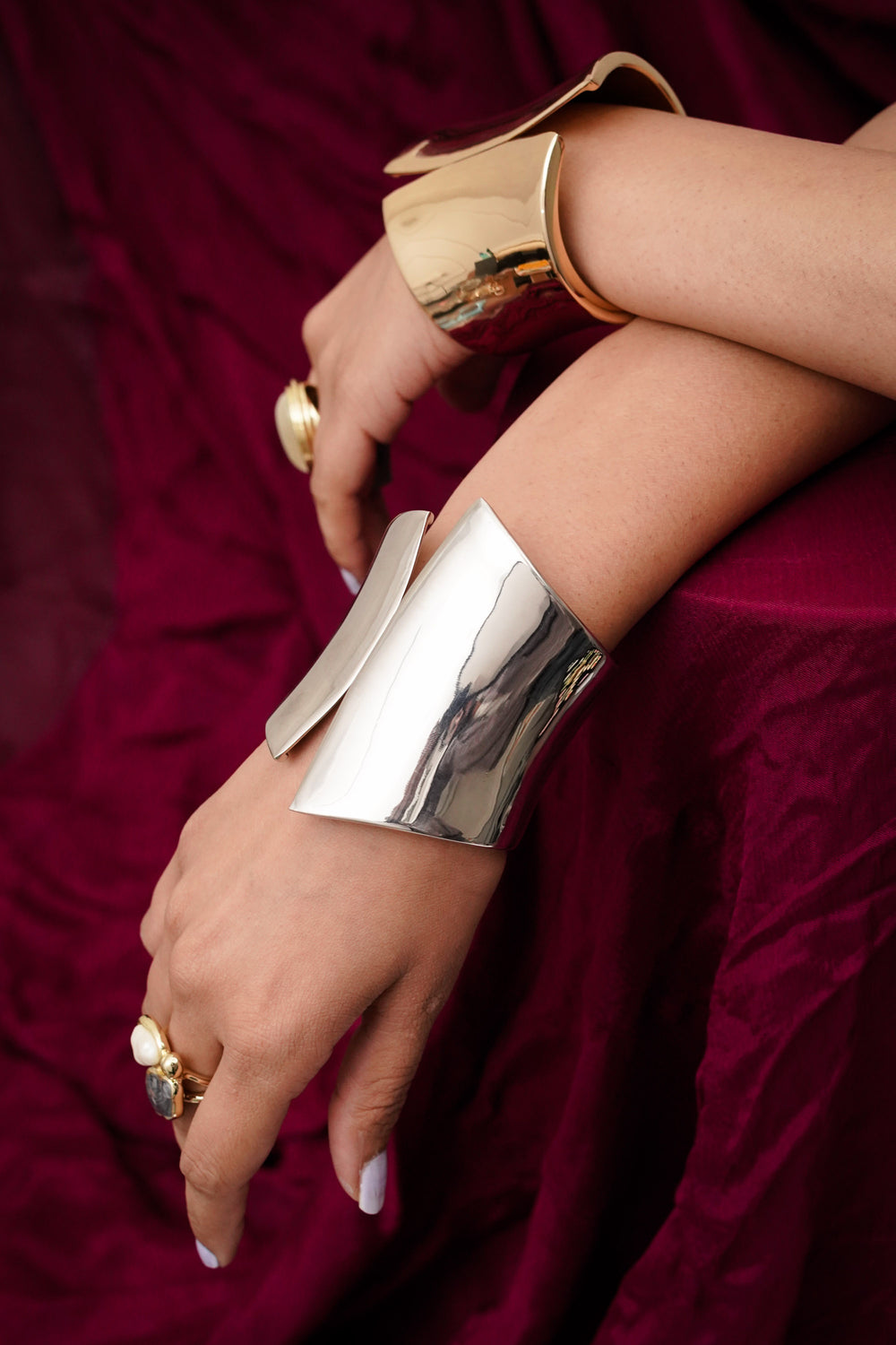 Stylish gold and silver hinged cuff