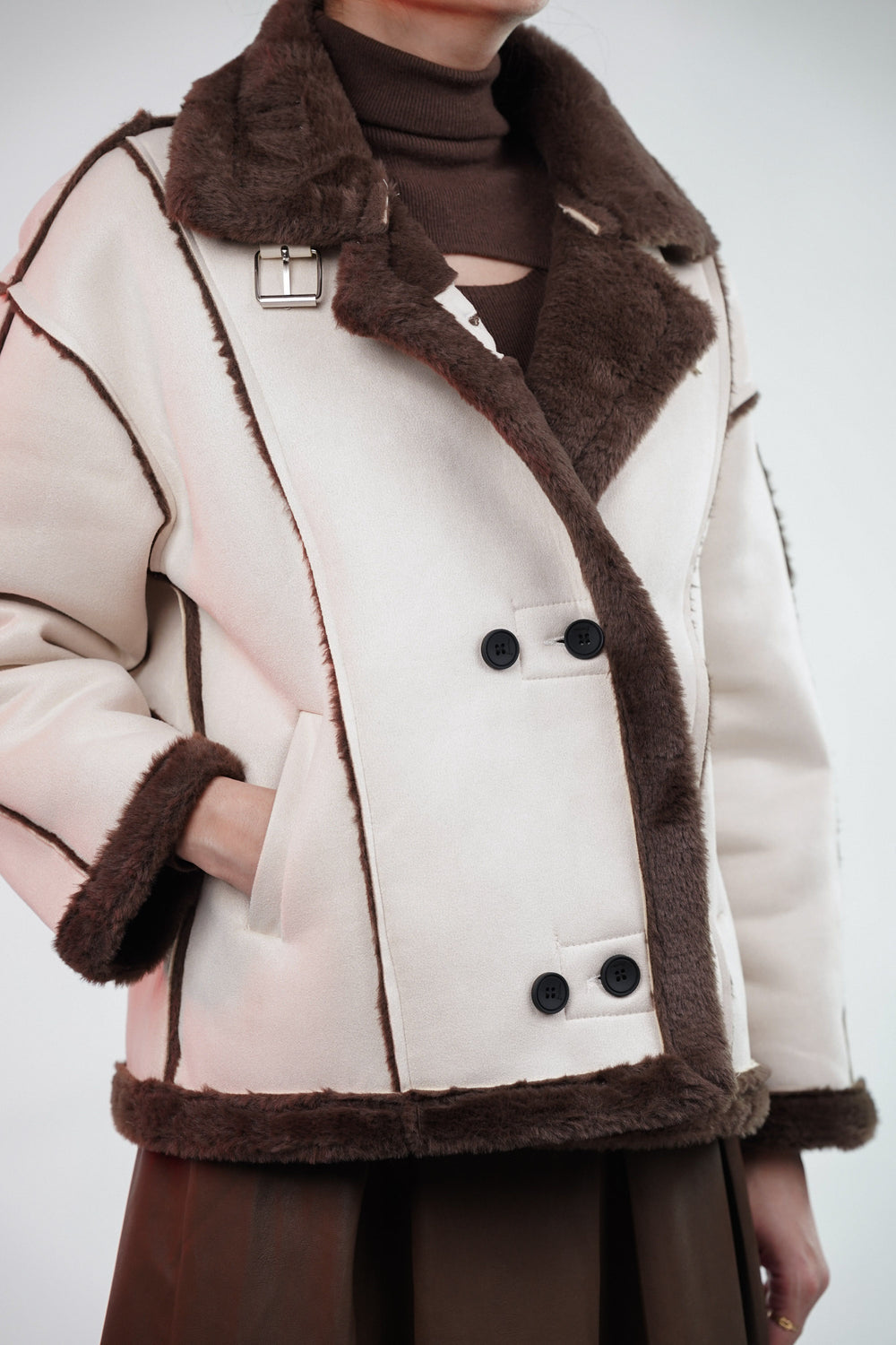 Winter suede jacket with fur accents for women