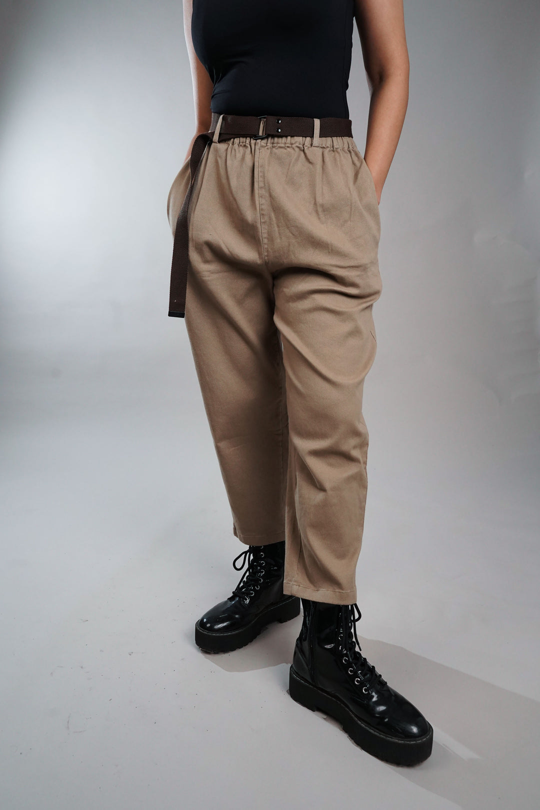Cream colored straight trouser pants with belt