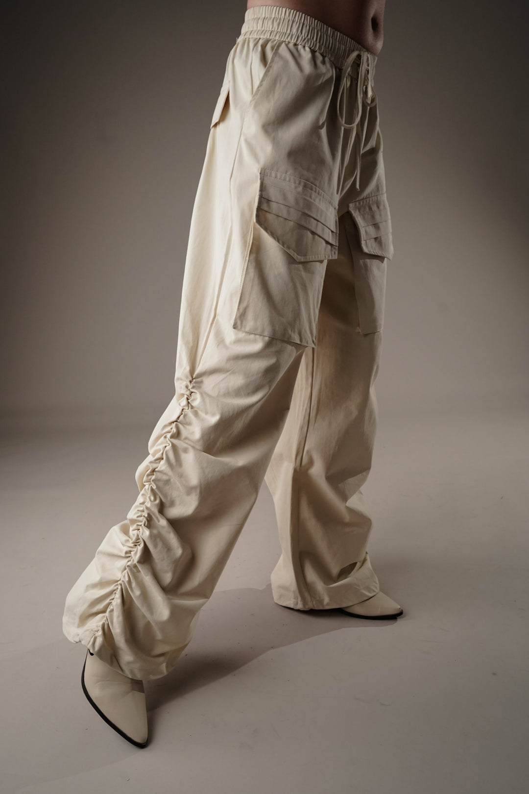 Beige cargo pants with oversized fit