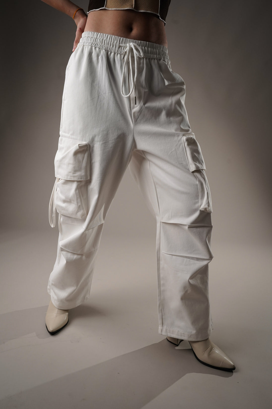 Oversized white cargo pants streetwear style