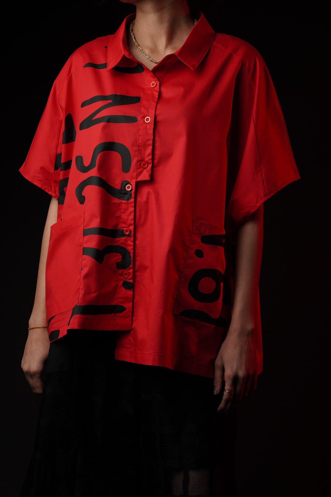 Red oversized shirt for a bold streetwear statement