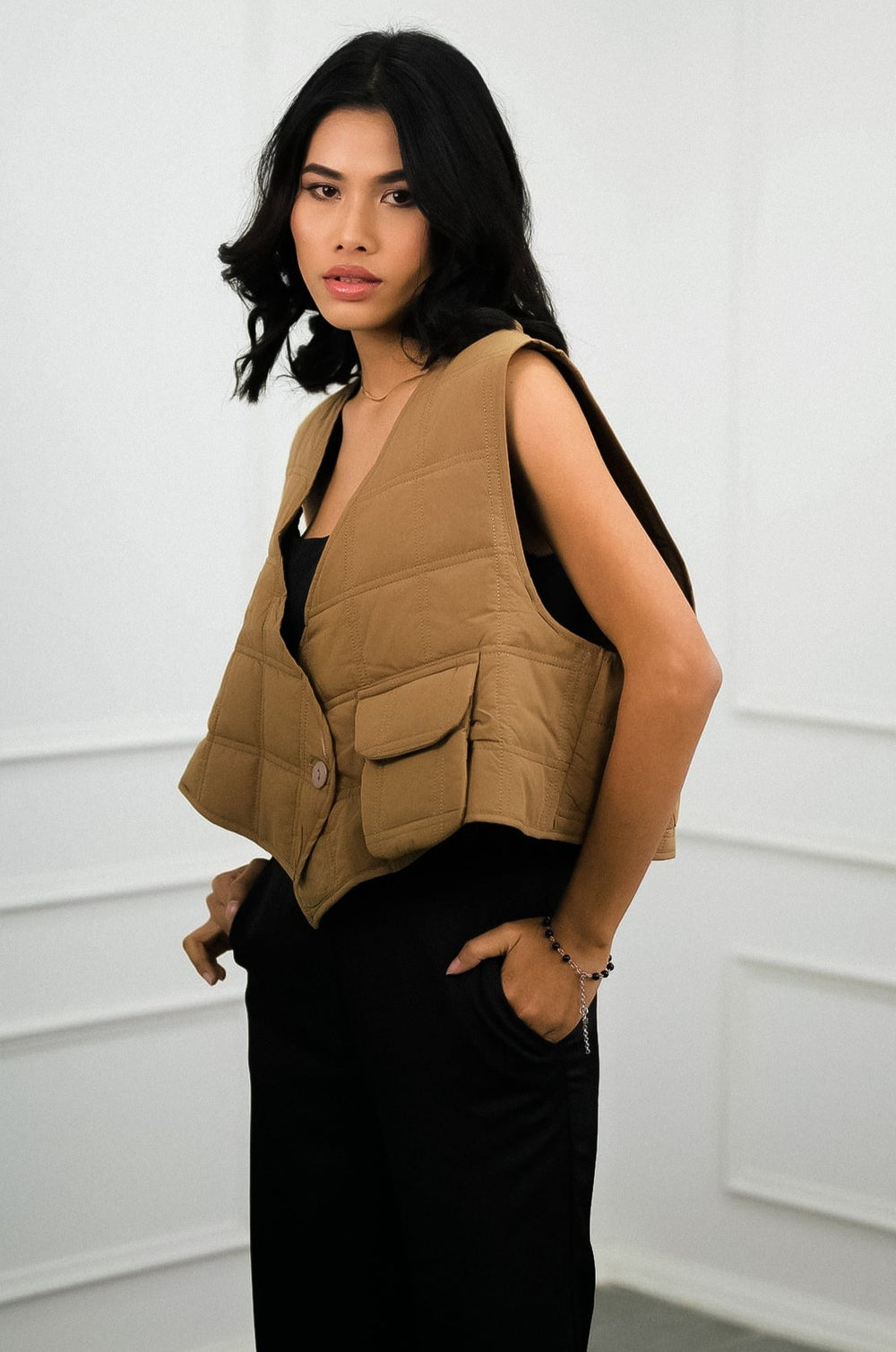 Chic Brew Vest Elevate your winter wardrobe with this fashionable quilted piece