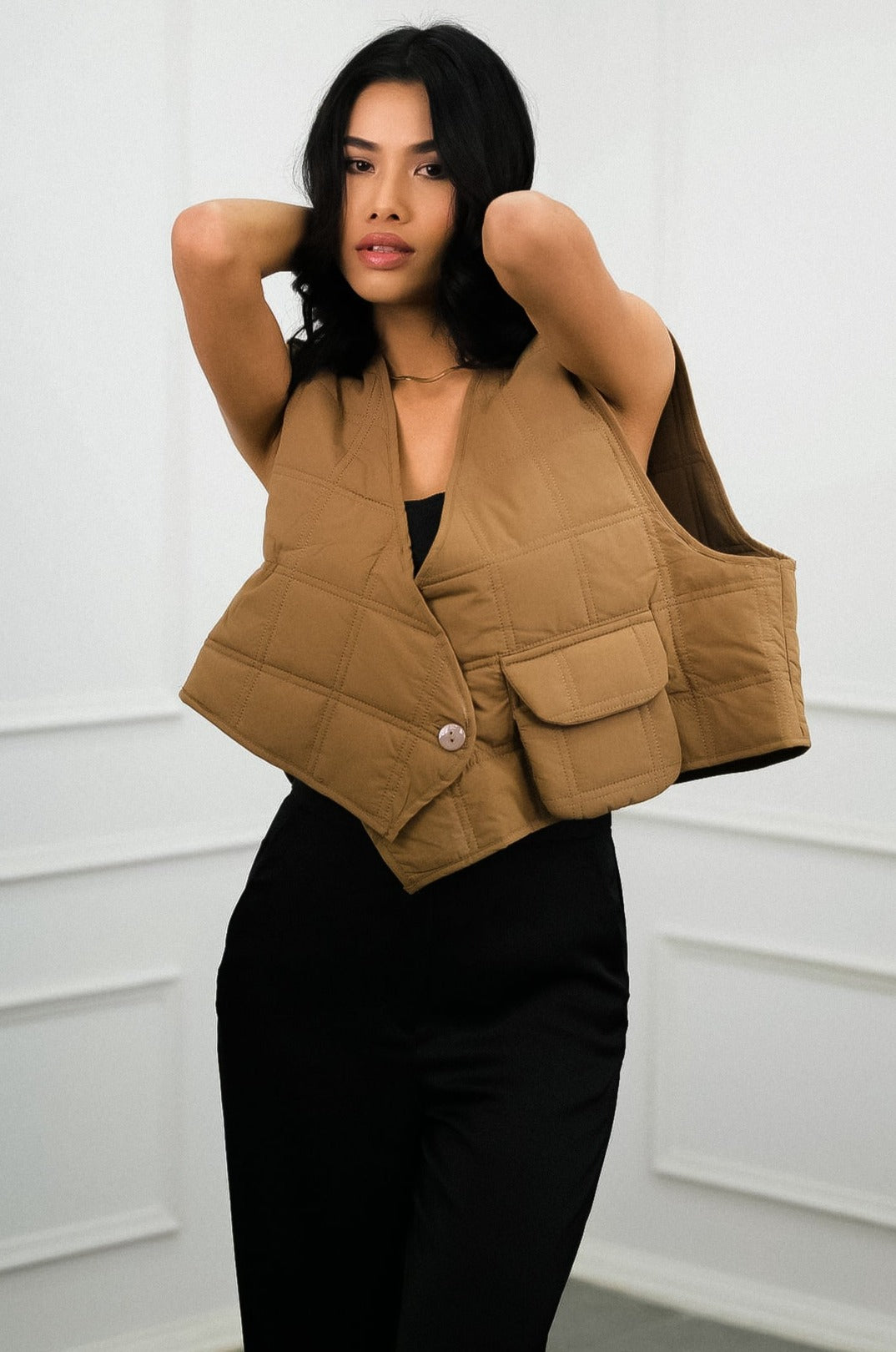 Versatile Quilted Outerwear Brew Vest adds a touch of warmth to any outfit