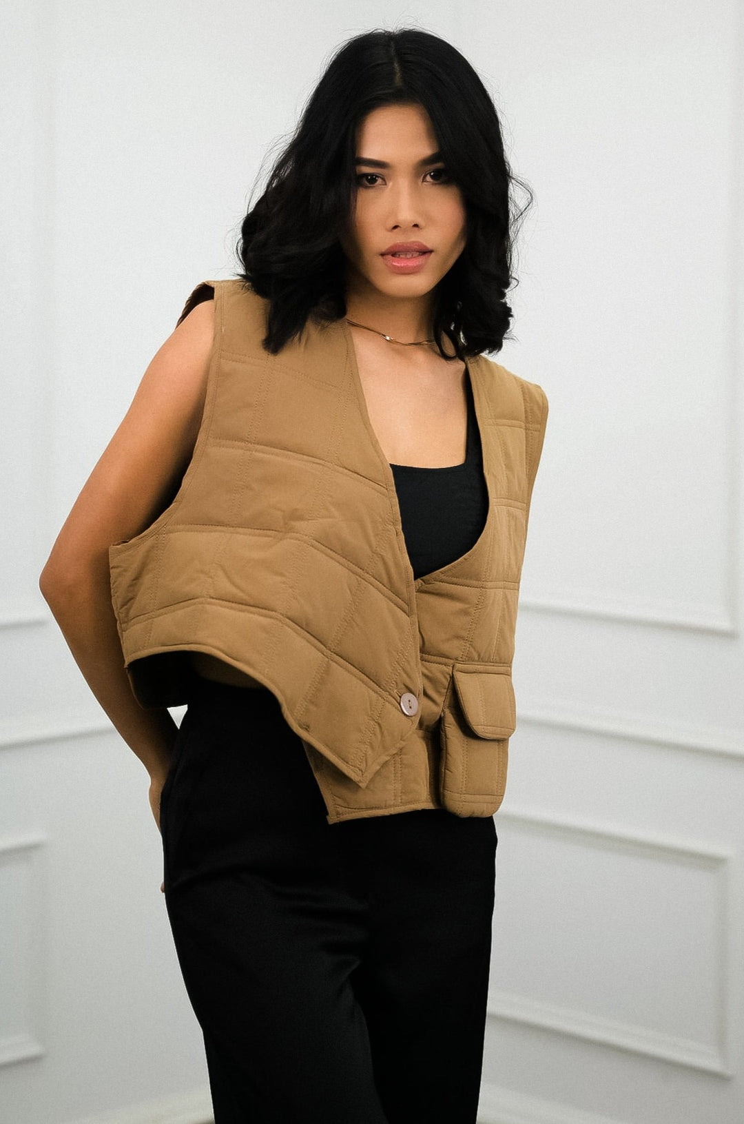 Fashionable Brew Quilted Sleeveless Jacket Stay cozy in style with this quilted vest