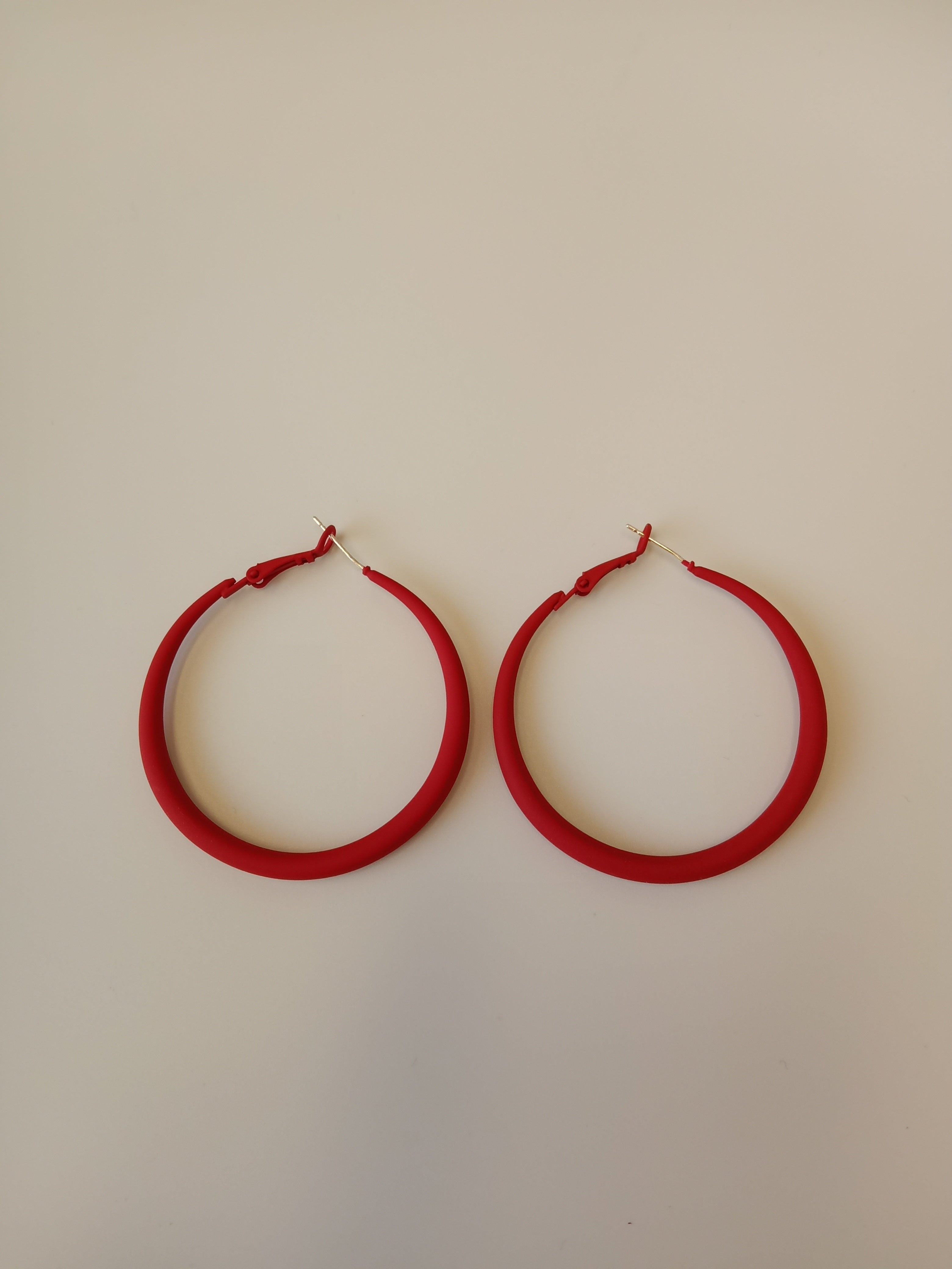 Red round store earrings