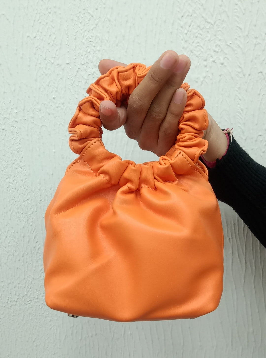 Orange colored  Mini Bag