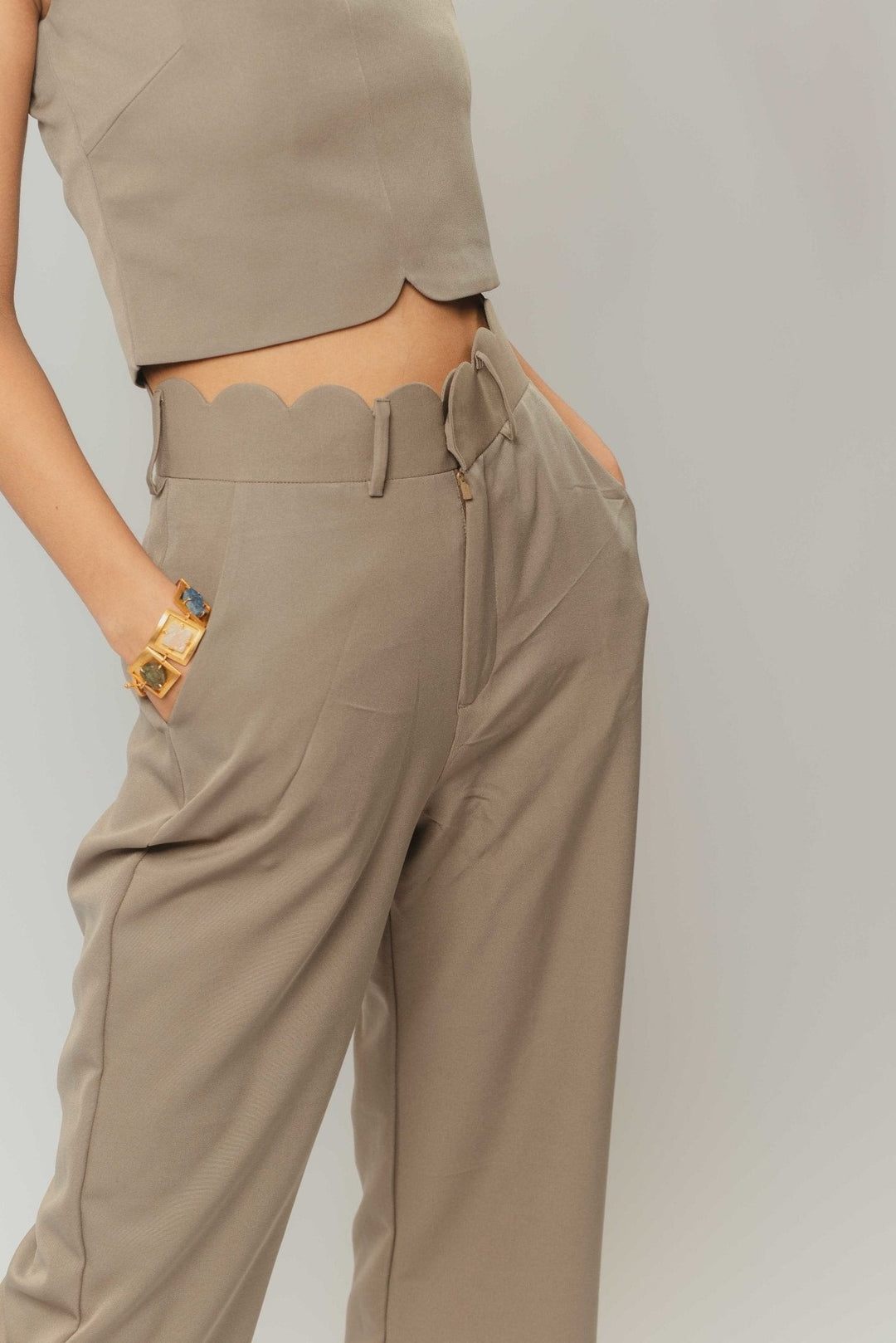High waisted pants with hem variation crop top