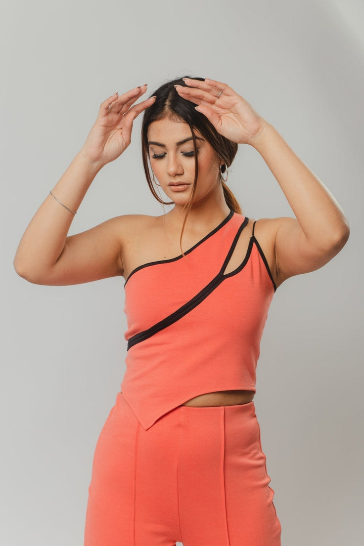Sleeveless coral knit top for stylish look